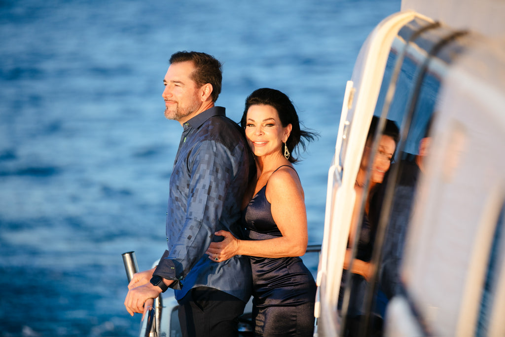 Beautiful couple aboard a private yacht charter with Best Cabo Yachts for their proposal and engagement party